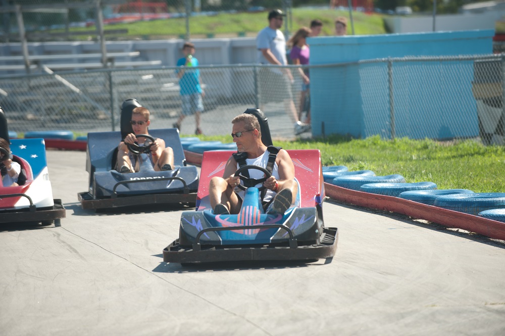 people riding go karts